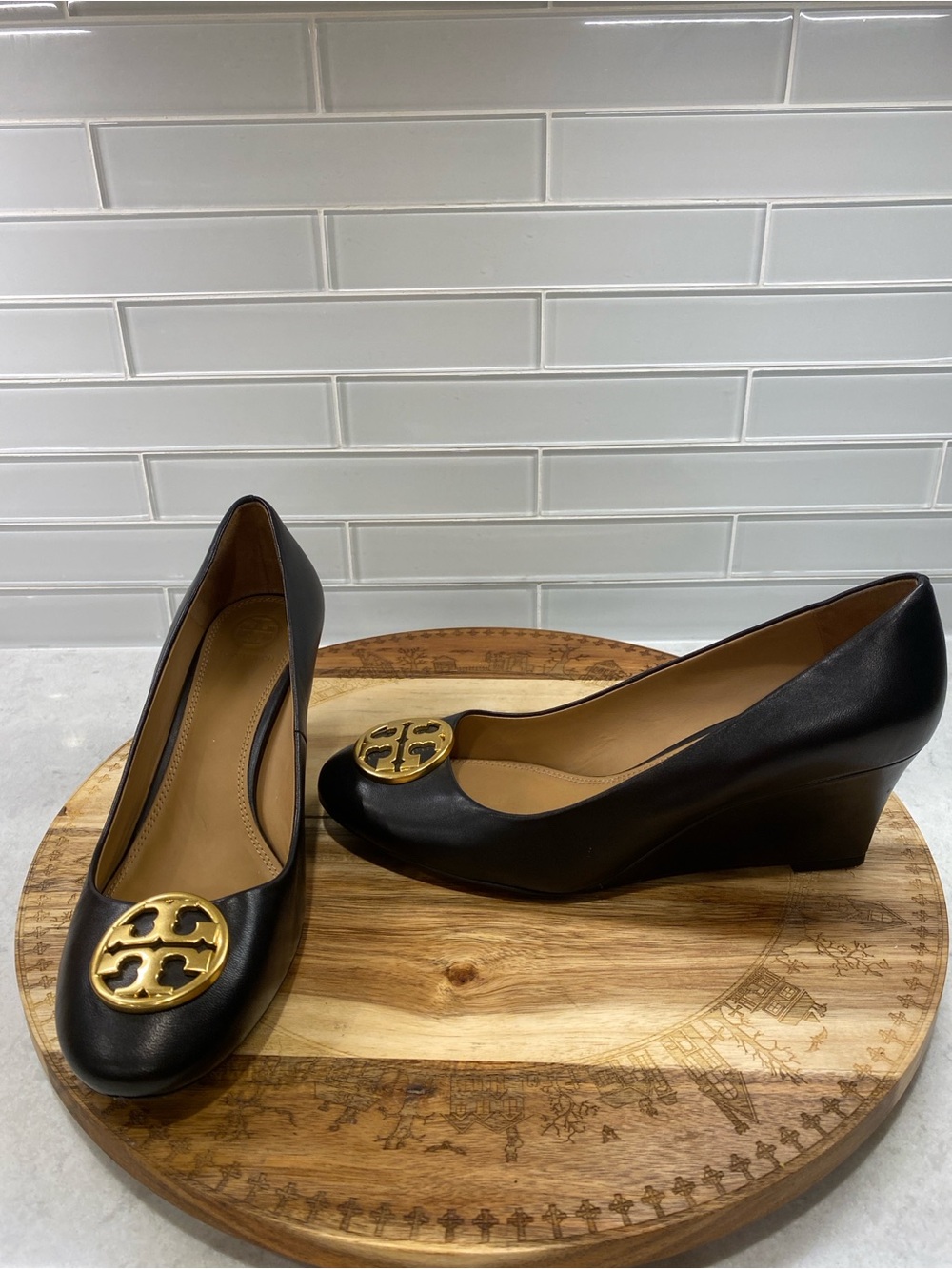Tory Burch Black Leather Wedge Pumps with Gold Logo Medallion